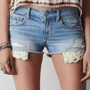 American Eagle Distressed Shortie Shorts Size 6 Exposed Pattern Pockets Stretch.